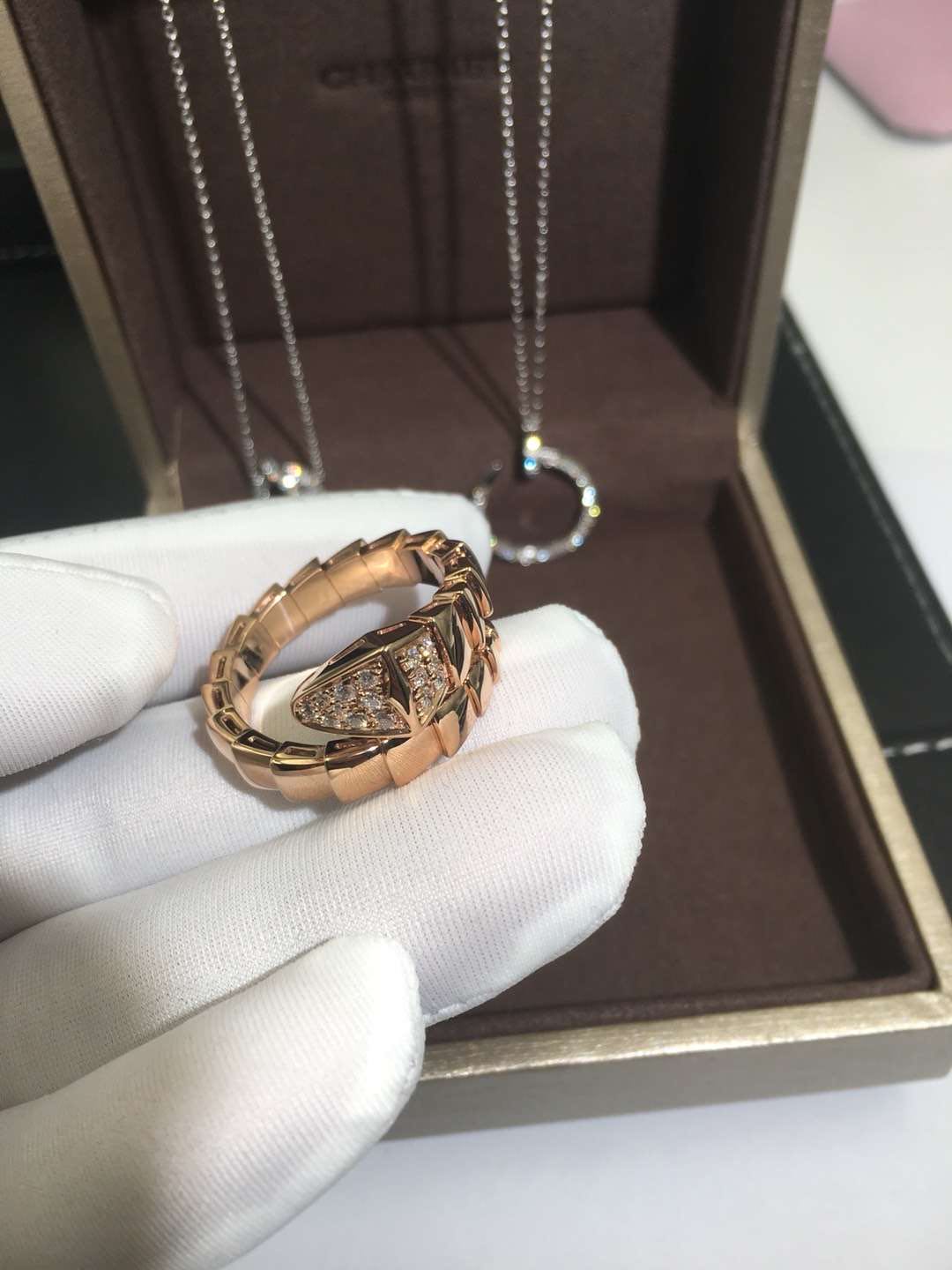 Bvlgari Serpenti one-coil ring in 18kt rose gold, set with pavé diamonds on the head